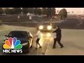 Angry Suspect Chasing And Beating Sheriff’s Deputy Is Caught On Camera | NBC News