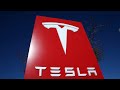 Tesla stock touches record high after Wedbush analyst increases price target