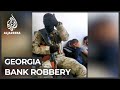 Georgia bank robber escapes after hostages freed