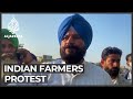 Thousands of farmers march to Indian capital defying tear gas