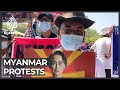 Huge rallies in Myanmar for ninth day as army steps up arrests
