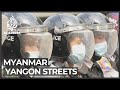 Thousands of Myanmar protesters in standoff with police in Yangon
