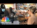 WATCH: Mother Shouts Racial Slurs At Black Cashier After Refusing To Wear Mask | NBC News NOW