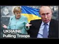 Merkel urges Putin to pull troops back from Ukraine border
