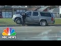 Watch: Woman Chases Her Own Car As It's Stuck In Reverse | NBC News NOW