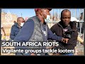 South Africa vigilantes step in as rioters overwhelm police