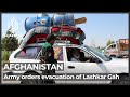 Afghan forces order civilians to leave city under Taliban siege