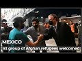 Afghan refugee group arrives in Mexico after fleeing Taliban rule