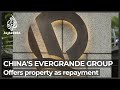 China pumps $14bn in cash into market amid Evergrande crisis