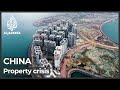 China property crisis: Evergrande fights demolition of dozens of buildings