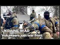 ‘We are going to defend ourselves’: Ukrainians join war front