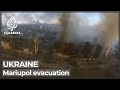 Civilian convoy leaves Ukraine's Mariupol after failed attempts