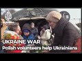 Polish volunteers turn out to help Ukrainians seeking shelter