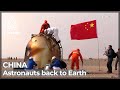 Chinese astronauts return to Earth after six months in space