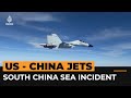 Chinese jet comes within metres of US military aircraft | Al Jazeera Newsfeed