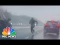 Watch: Massachusetts man runs across traffic to save driver in distress