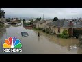 California levee fails, leading to floods and water rescues
