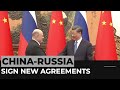 Russia, China sign new agreements, defying Western criticism