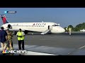 Delta flight without functioning nose landing gear lands safely on runway