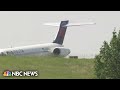 Delta jet makes emergency landing without nose gear
