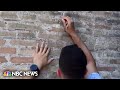 Man caught on camera scribbling on a Colosseum wall