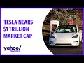 Tesla nears $1 trillion market cap while closing charger deals with competitors