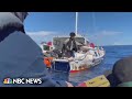 Watch: Moment Australian sailor and his dog are rescued after months adrift