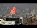 Videos show a huge explosion and rockets launched from the Gaza Strip