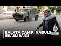 Israeli forces raid homes in a refugee camp injuring several people in Nablus