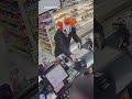 Man in a clown mask robs a gas station at gunpoint