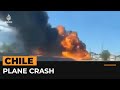 Plane crashes onto highway in Chile