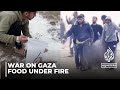 Israeli troops shoot at Palestinians receiving aid.