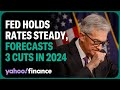 Fed holds rates steady, forecasts 3 rate cuts in 2024