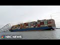 First close-up look at container ship that crashed into bridge