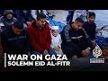 ‘Steadfast despite grief’: Palestinians in Gaza mark solemn Eid al-Fitr