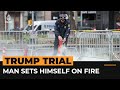 Man sets himself on fire outside Trump trial courthouse | AJ #Shorts