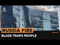 Deadly fire traps people inside Russian office building | #AJshorts