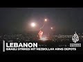 Israeli strikes hit Hezbollah arms depots in Lebanon, sparking fears of escalating conflict