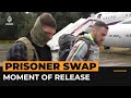 Russia’s FSB releases video of moment prisoners are freed in swap | AJ #Shorts