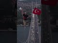 Slackliner crosses from Asia to Europe over Istanbul Bridge | AJ #shorts