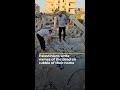 Palestinians write names of the dead on rubble of their home | AJ #shorts