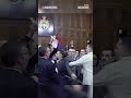 Fighting broke out in the Serbian parliament the collapse of a train station roof