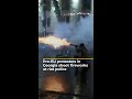 Protesters in Georgia shoot fireworks at riot police | AJ #shorts